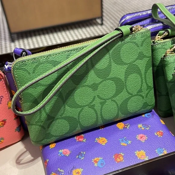 Coach Corner Zip Wristlet In Signature Canvas 
Im/Neon Green - Picture 4 of 16